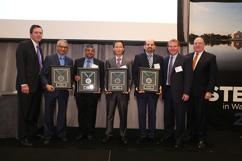 (L-R) Roger Newport, Chairman, AISI, Chief Executive Officer, AK Steel Corporation; Sriram Sadagopan, Group Manager, Applications Technology; Narayan Pottore, Principal Scientist, Product Development; Gang Huang, Lead Engineer, Applications Technology; Hassan Ghassemi-Armaki, Lead Engineer, Applications Technology; John Brett, Vice Chairman, AISI, President and CEO, ArcelorMittal USA; Thomas J. Gibson, President and CEO, AISI
